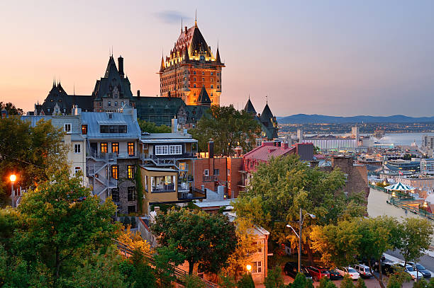 Quebec City Quebec City skyline with Chateau Frontenac at sunset viewed from hill quebec photos stock pictures, royalty-free photos & images