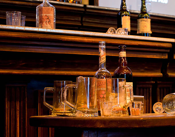 istock Bottles of whiskey and glasses 526223539