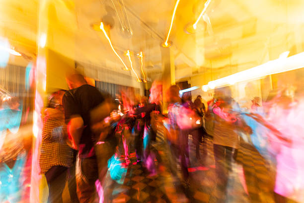 istock colorful crowd on concert,disco night 526223681
