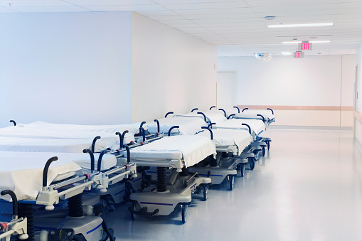 Hospital Beds Lining Hallway