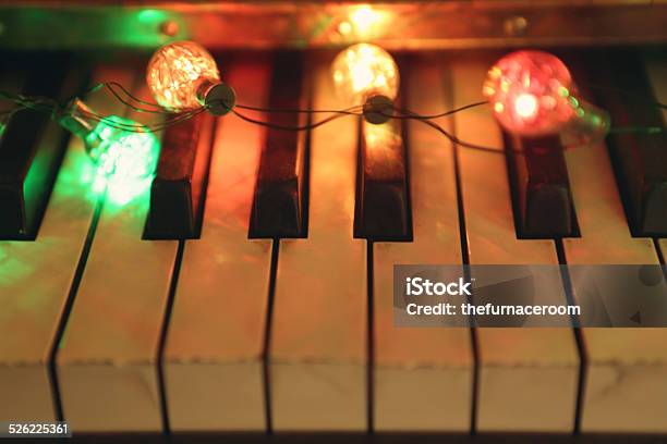 Piano And Lights Stock Photo - Download Image Now - Christmas, Musical Instrument, Illuminated