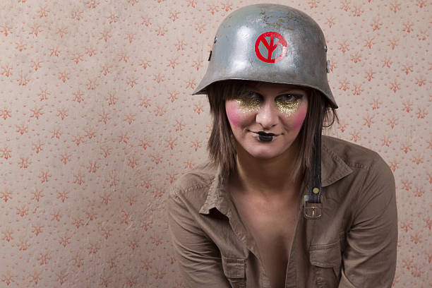 istock woman in army hat and a  creative makeup 526227069