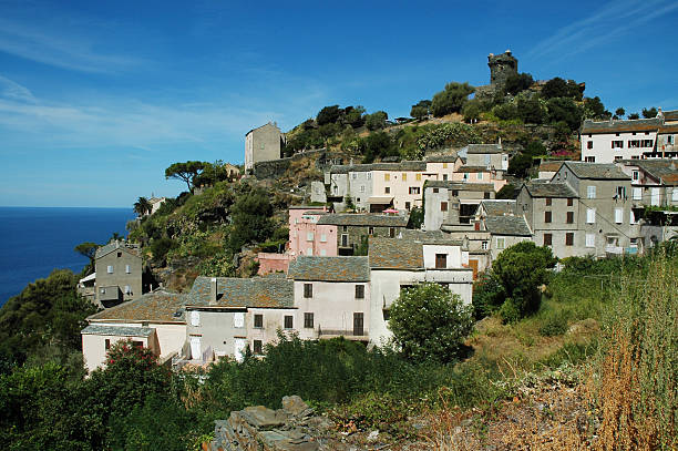 istock Nonza village with sea view. Corsica 526228295