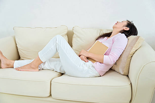 istock woman slipping on the sofa 526228495