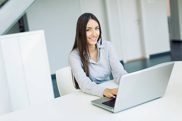 istock Young woman in the office 526233397