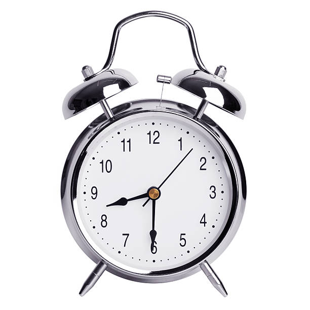 istock Half of the ninth on a round alarm clock 526233649