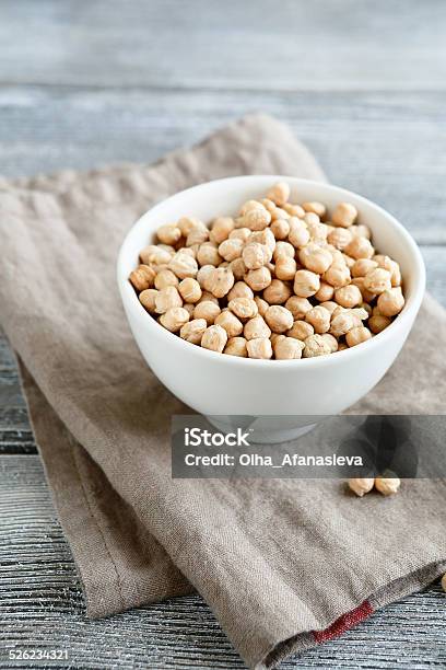 Raw Beans In A Bowl On Boards Stock Photo - Download Image Now - Bowl, Chick-Pea, Close-up