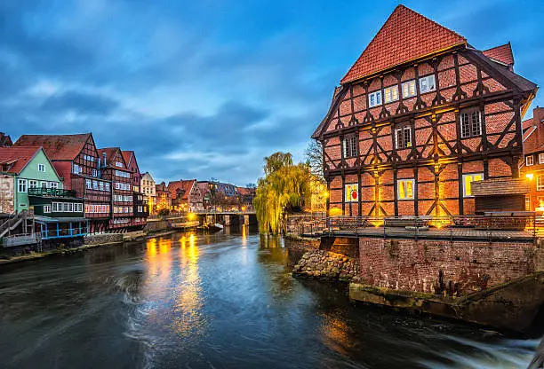 View on the Old Harbour (Alter Hafen) and Stintmarkt (Fish Market) at the river Illmenau in Lüneburg at dusk.