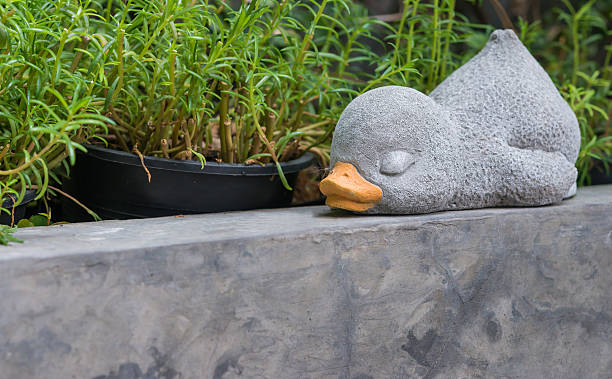 istock The sleeping duck made from cement for decoration 526240339