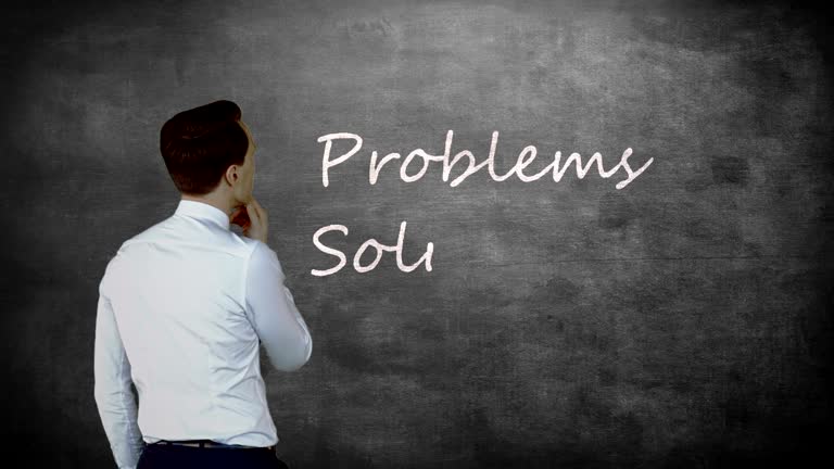 Thoughtful businessman looking at words