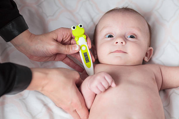 istock Mother baby thermometer 526244715
