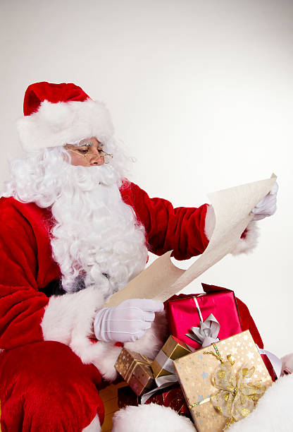 istock Santa Claus holding blank paper 526247627