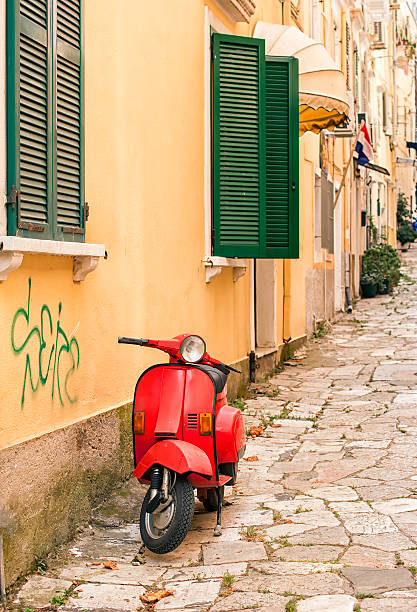 istock Red scooter on street, Greece 526248815