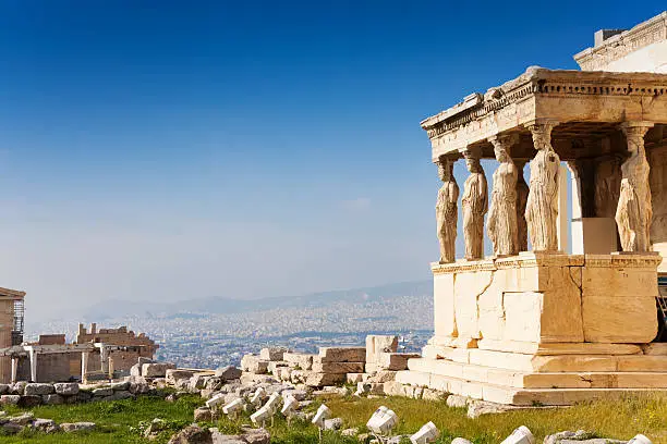 Beautiful view of Erechtheion with panorama of Acropolis in summer in Athens, Greece
