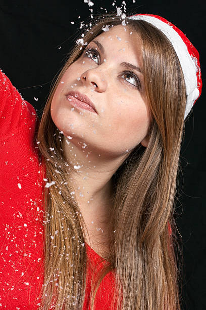 istock Girl playing with snow 526250165