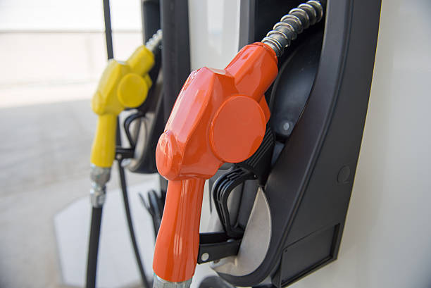 Fuel dispenser at a gasoline station stock photo