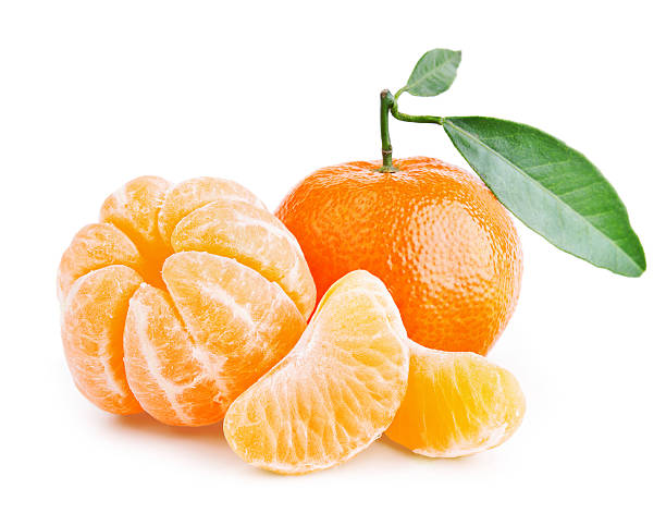 istock tangerines with leaves on white background 526257389