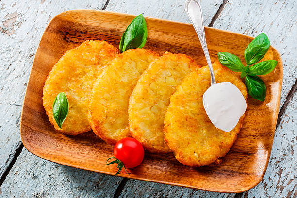 istock potato pancakes with sour cream 526258415