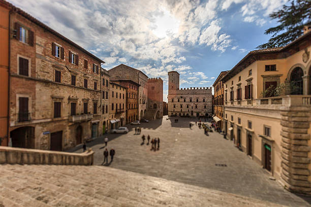 Piazza del Popolo is the main square of Todi, a charming, medieval town on top of a hill overlooking the beautiful valley of the Tiber. The square is one of the most interesting town squares of the Middle Ages in Italy. Umbria. -selective focus-