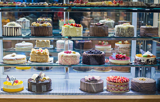 Cake display on a cafeteria.