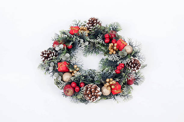 istock Traditional christmas wreath on white background 526261075