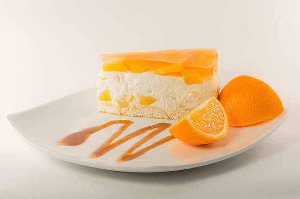 istock Cheesecake with orange jelly. 526262711