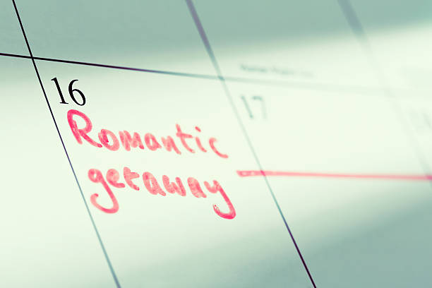 "escapada romántica" marcado durante varios días en calendario - time month rear view calendar fotografías e imágenes de stock
