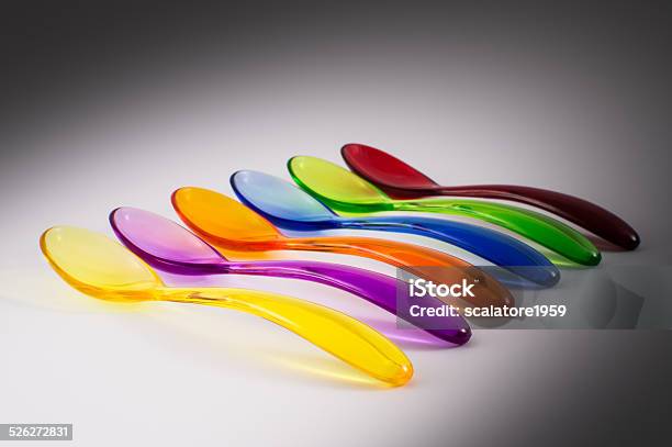 Colored Plastic Spoons Stock Photo - Download Image Now - Arrangement, Blue, Child