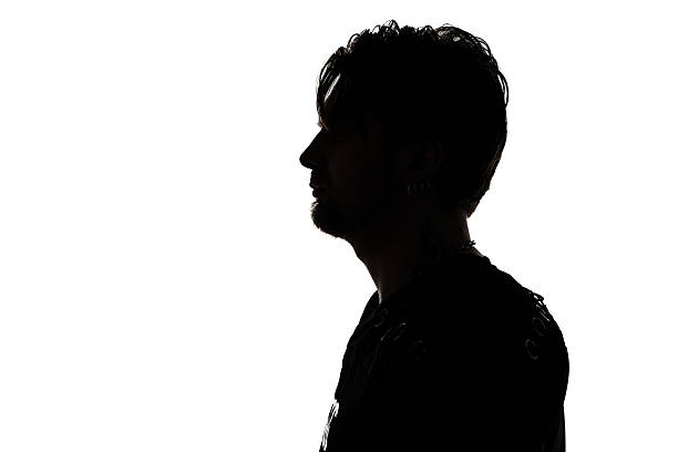 istock Image of young man's silhouette in profile 526273155
