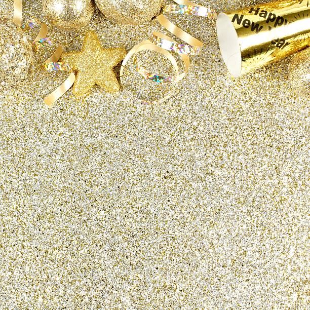 istock New Years Eve border on shiny gold background 526273613