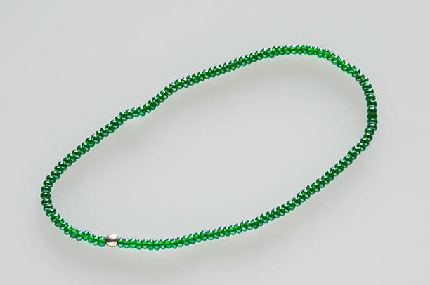 istock green pearl necklet 526275863