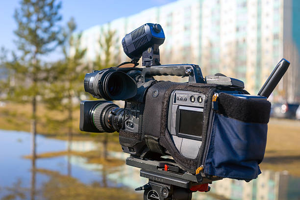 istock Journalistic television camera on a city street. 526275896