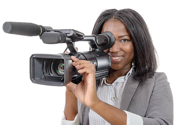 istock young African American women with professional video camera 526277806