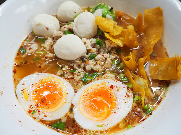istock Spicy noodle with minced pork and boiled eggs 526278840