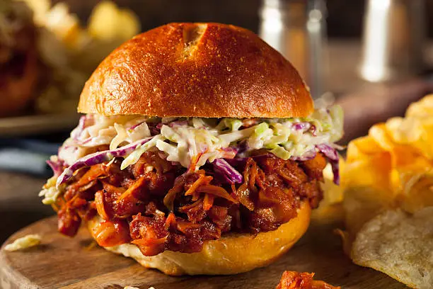 Homemade Vegan Pulled Jackfruit BBQ Sandwich with Coleslaw and Chips