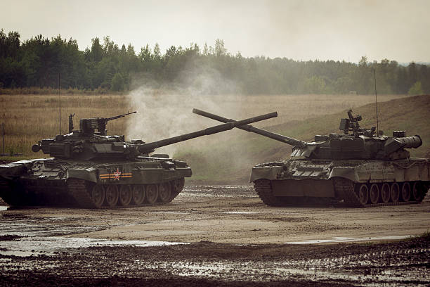 istock two Russian T-90 tank on military range 526283113