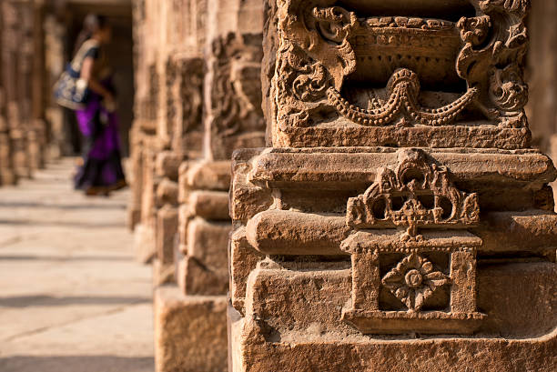istock Indian pillar architecture woman in background. 526283274