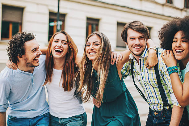 istock Group of friends holding together 526283308