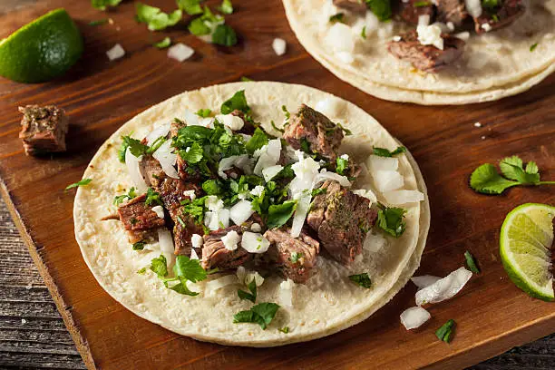 Homemade Carne Asada Street Tacos with Cheese Cilantro and Onion