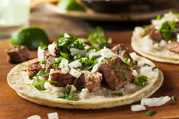 Homemade Carne Asada Street Tacos with Cheese Cilantro and Onion