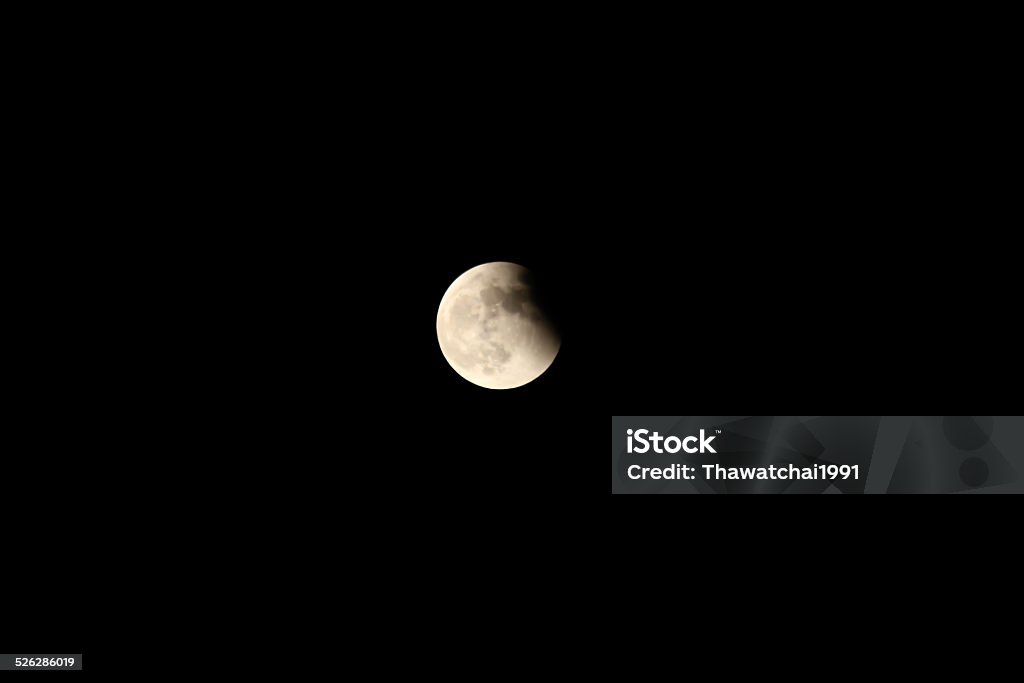 Partial Eclipse of the Moon in Black Night Astronomy Stock Photo