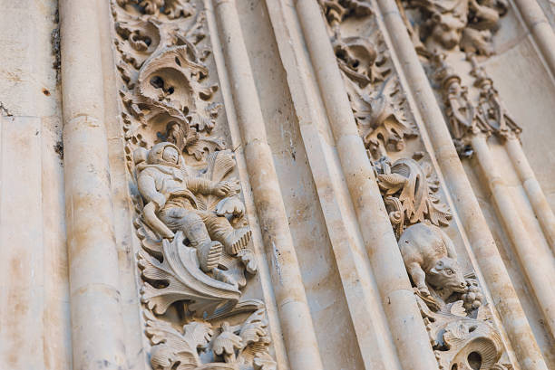 istock Salamanca Cathedral main door with an extremely carved wall. 526287010