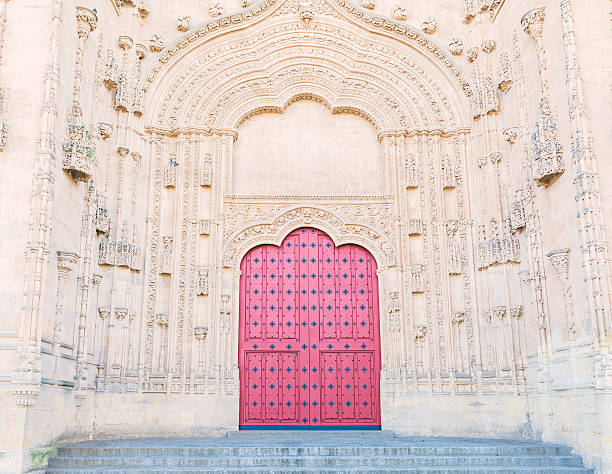 istock Salamanca Cathedral main door with an extremely carved wall. 526287278