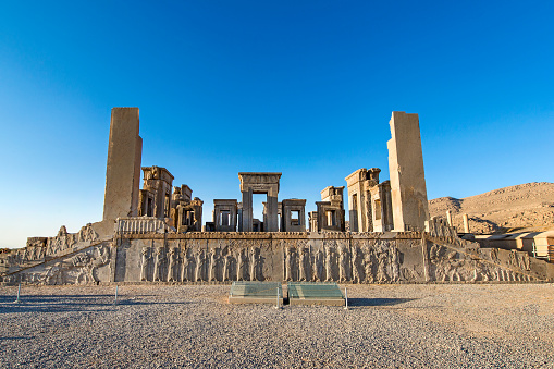 The ruins and columns of the Apandana in the ancient city of Persepolis, Iran.