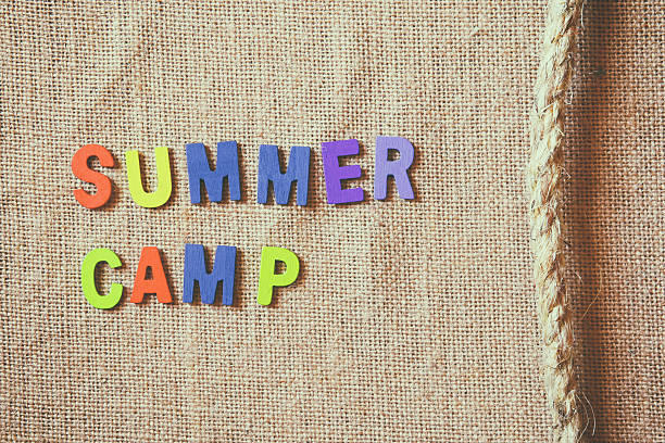 istock colorful wooden letters with phrase: SUMMER CAMP 526291800