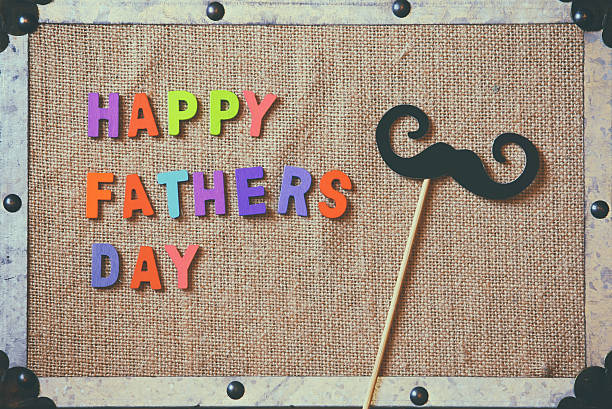 istock fathers day composition with colorful wooden letters 526292696
