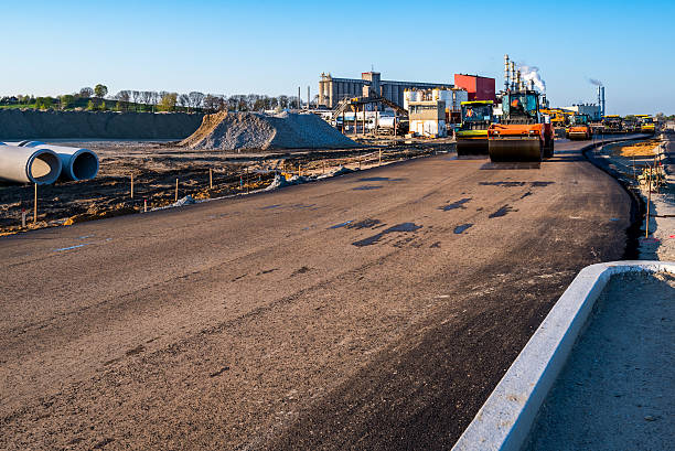Road rollers working on the construction site stock photo