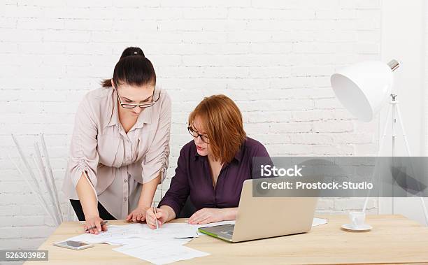 Teamwork Women Discuss Project In Office Stock Photo - Download Image Now - Adult, Adults Only, Architect