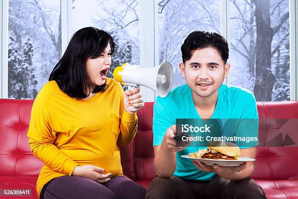 Furious Pregnant Mother On Her Husband Stock Photo - Download Image Now - Adult, Anger, Arguing