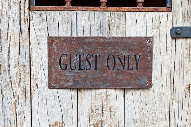 istock Guest Only Sign on wooden door 526306881